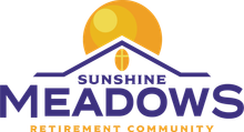 Logo for Sunshine Meadows Retirement Community: Purple text and roof with an orange sun.