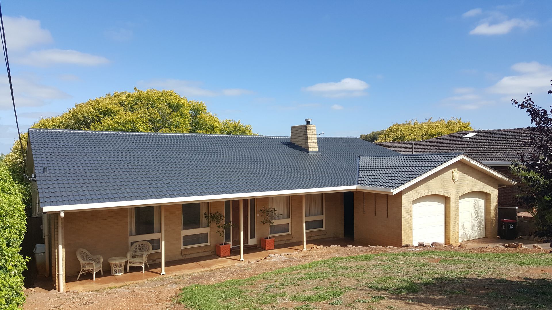 A close up of a roof with a lot of tiles on it.