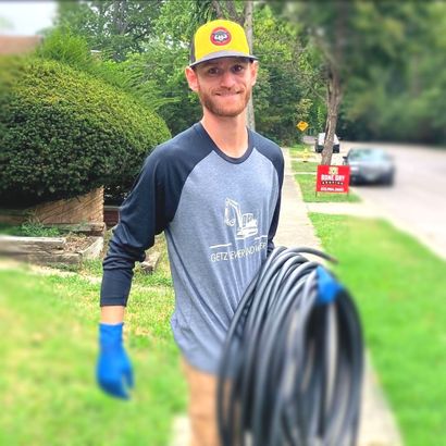 Smiling Plumber Worker — Cincinnati, OH — Getz Sewer & Water