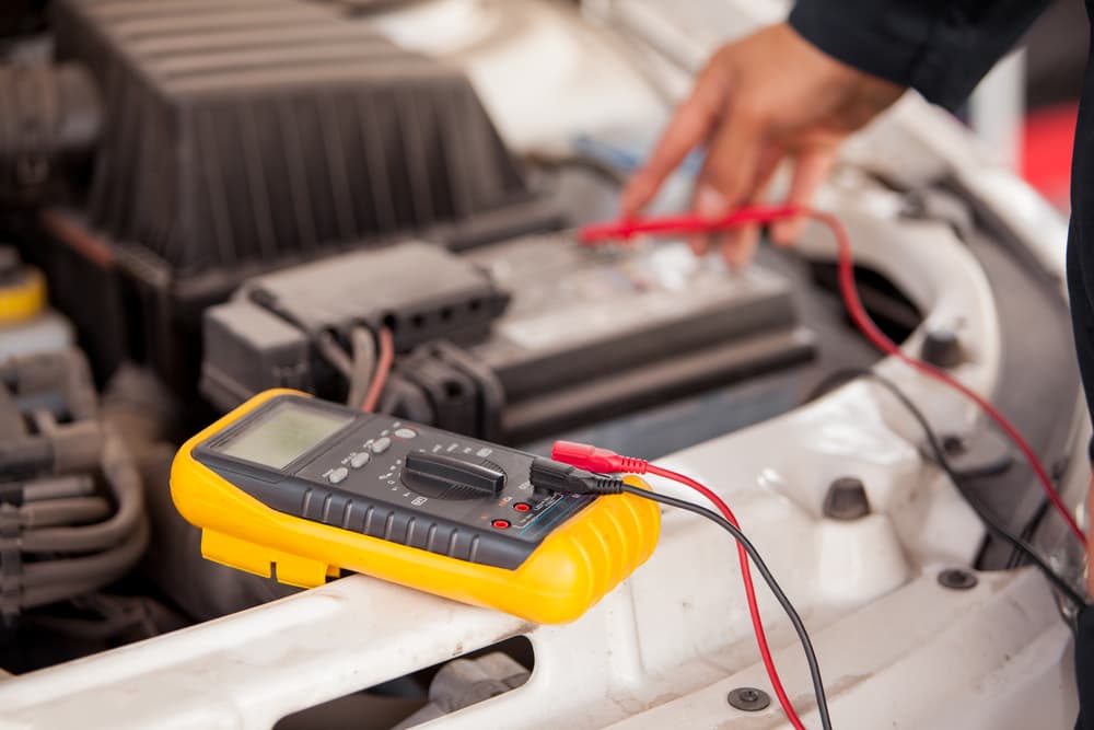 Checking Car Battery — Mechanic In Marulan, NSW