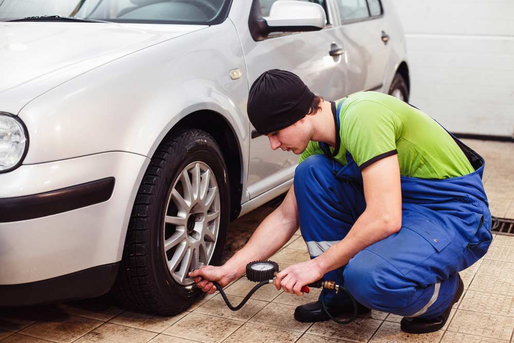Mechanic Checking Tyres — Mechanic In Marulan, NSW