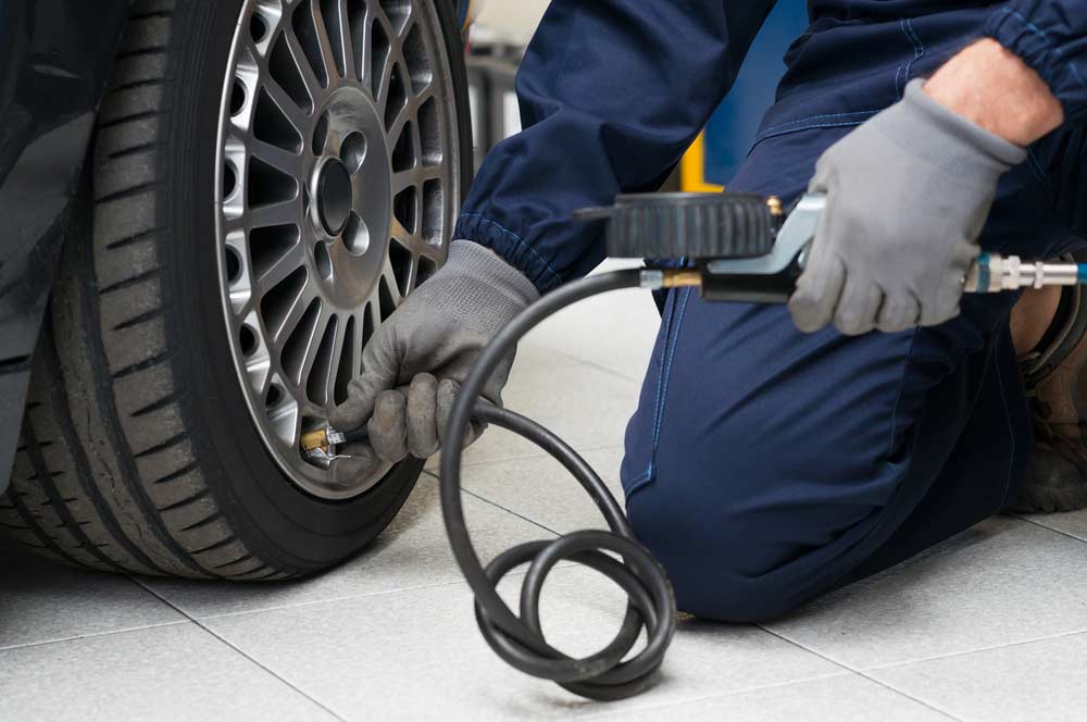 Mechanic Checking Tyre Pressure — Mechanic In Marulan, NSW