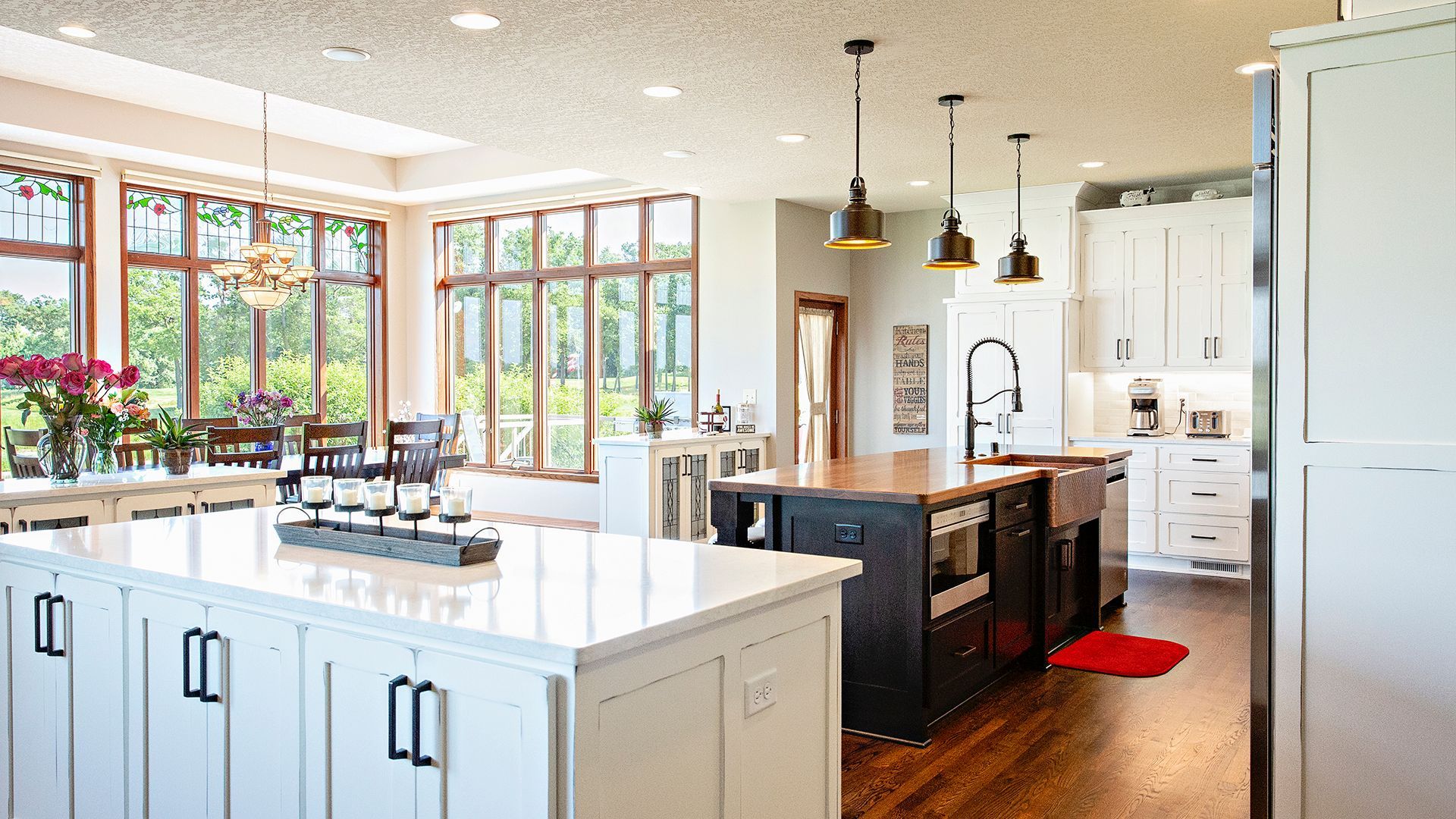 Open concept kitchen with large bright windows