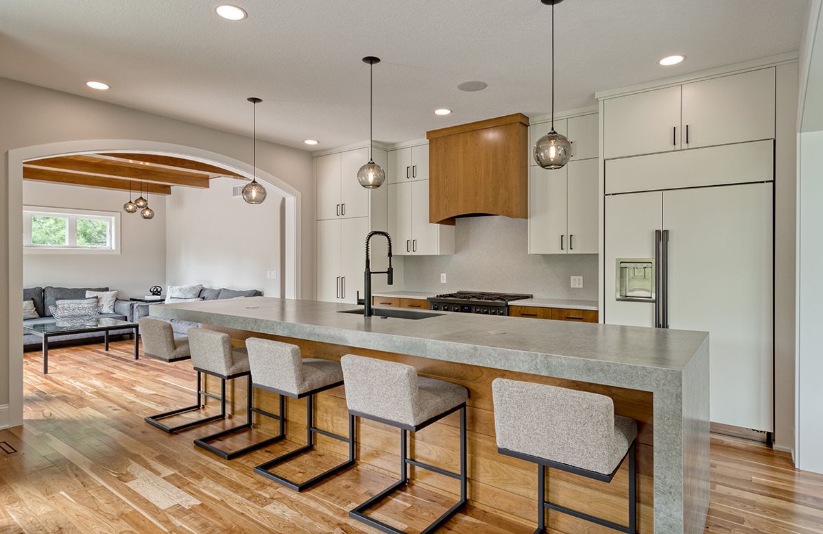 A living room with a fireplace and a flat screen tv.