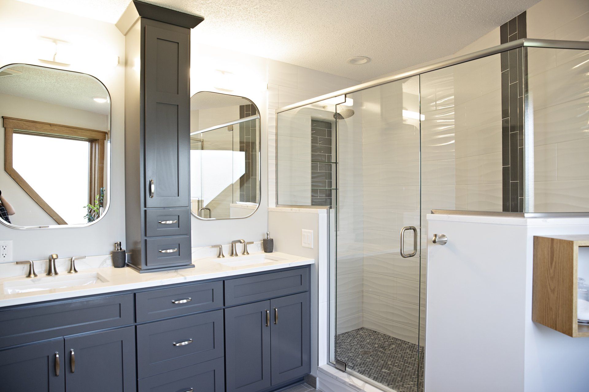 White house with brick chimney and covered front deck porch. Bathroom renovation by Dercon Construction. Tips for surviving a home renovation.