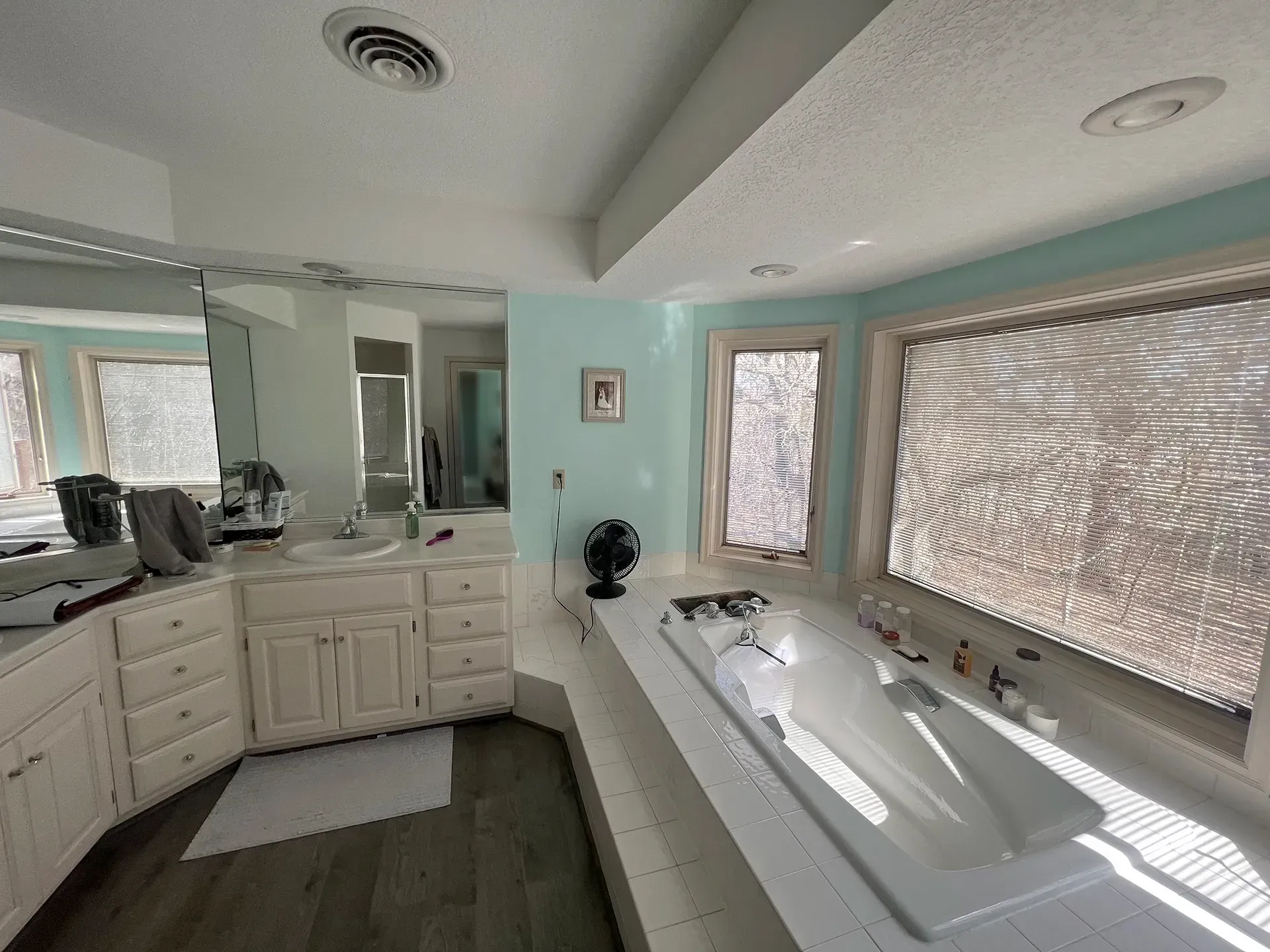 Before photo of oak cabinets and red backsplash