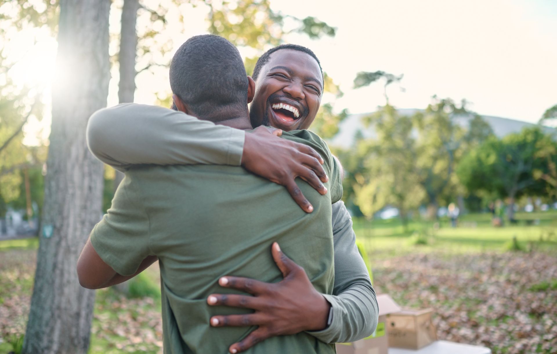 Happy and hug with volunteer friends.