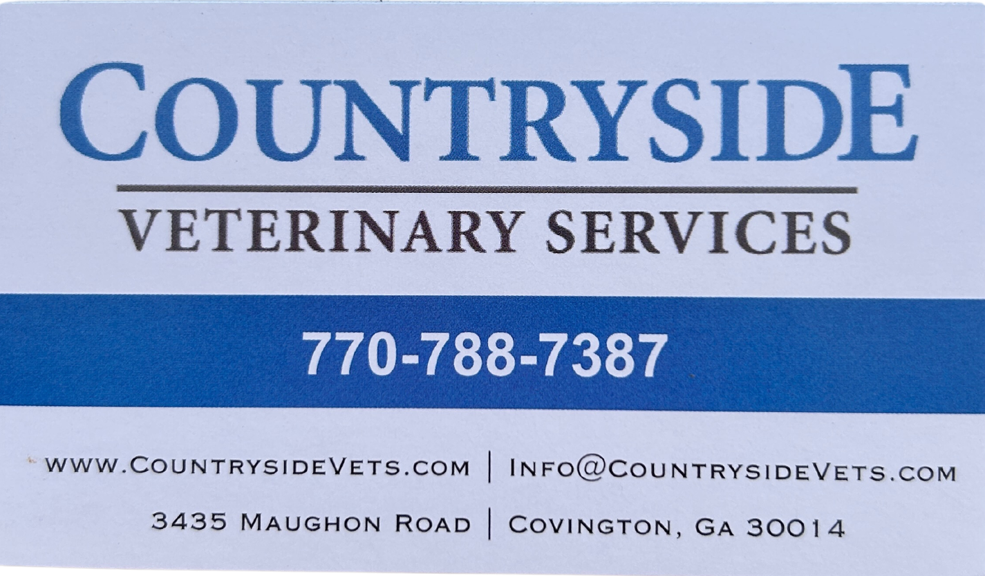 a blue and white sign for countryside veterinary services