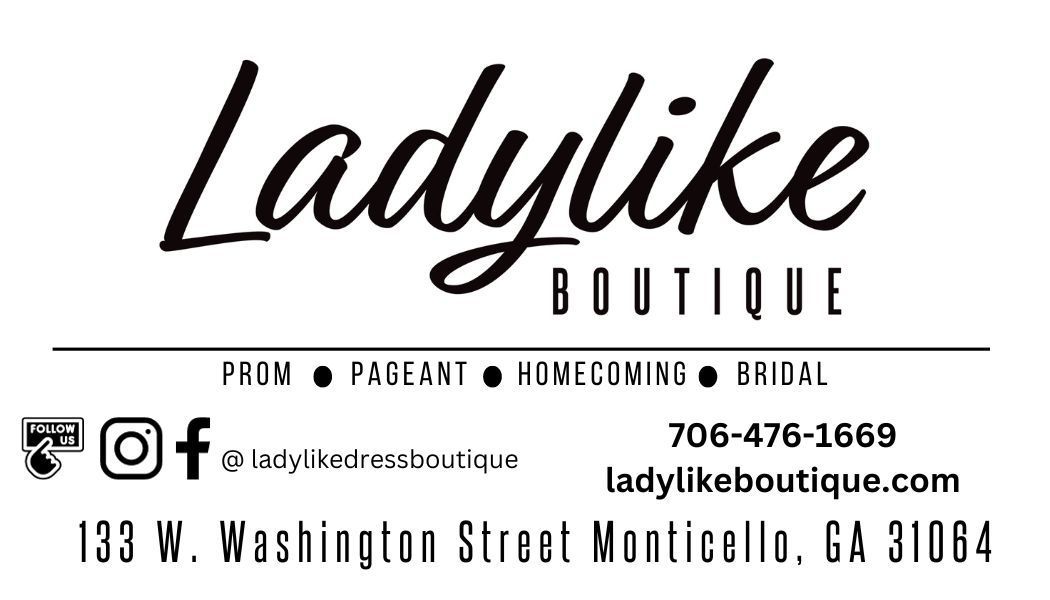 a logo for a boutique called ladylike boutique
