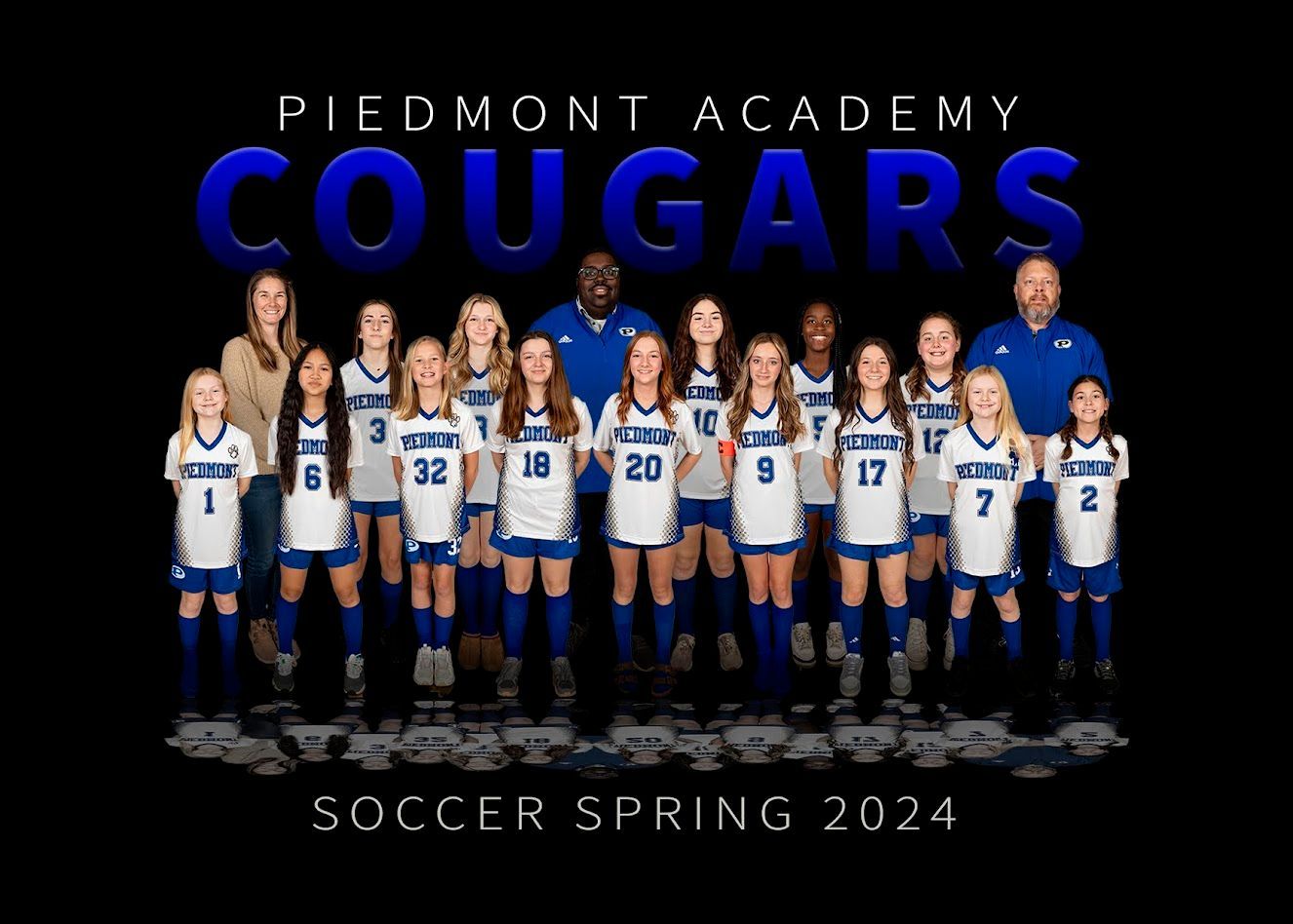 the piedmont academy cougars soccer team is posing for a team photo .