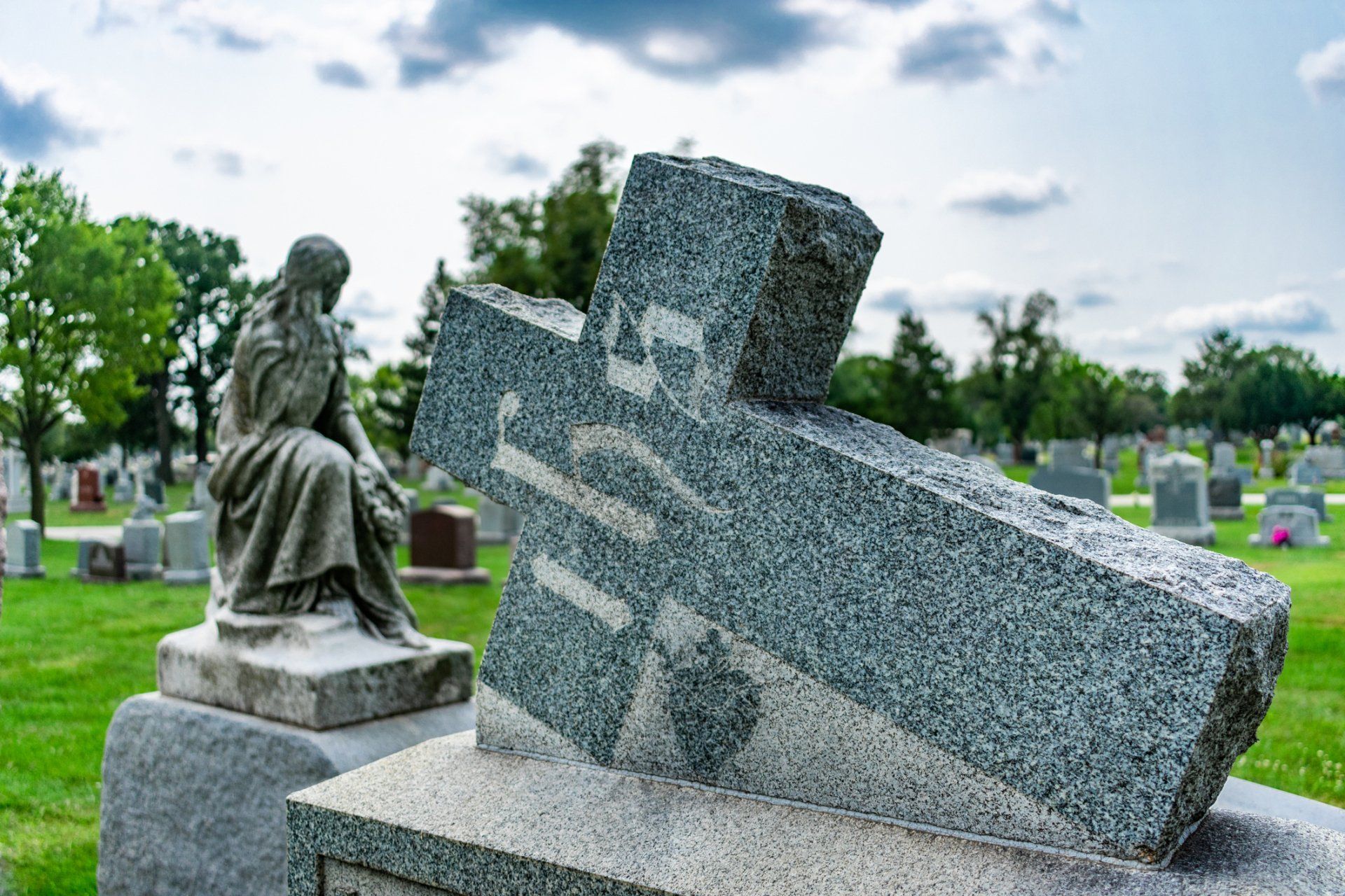 IHS Cross On Top Of A Tombstone At A Cemetery - Gippsland, VIC - Carustone Memorials