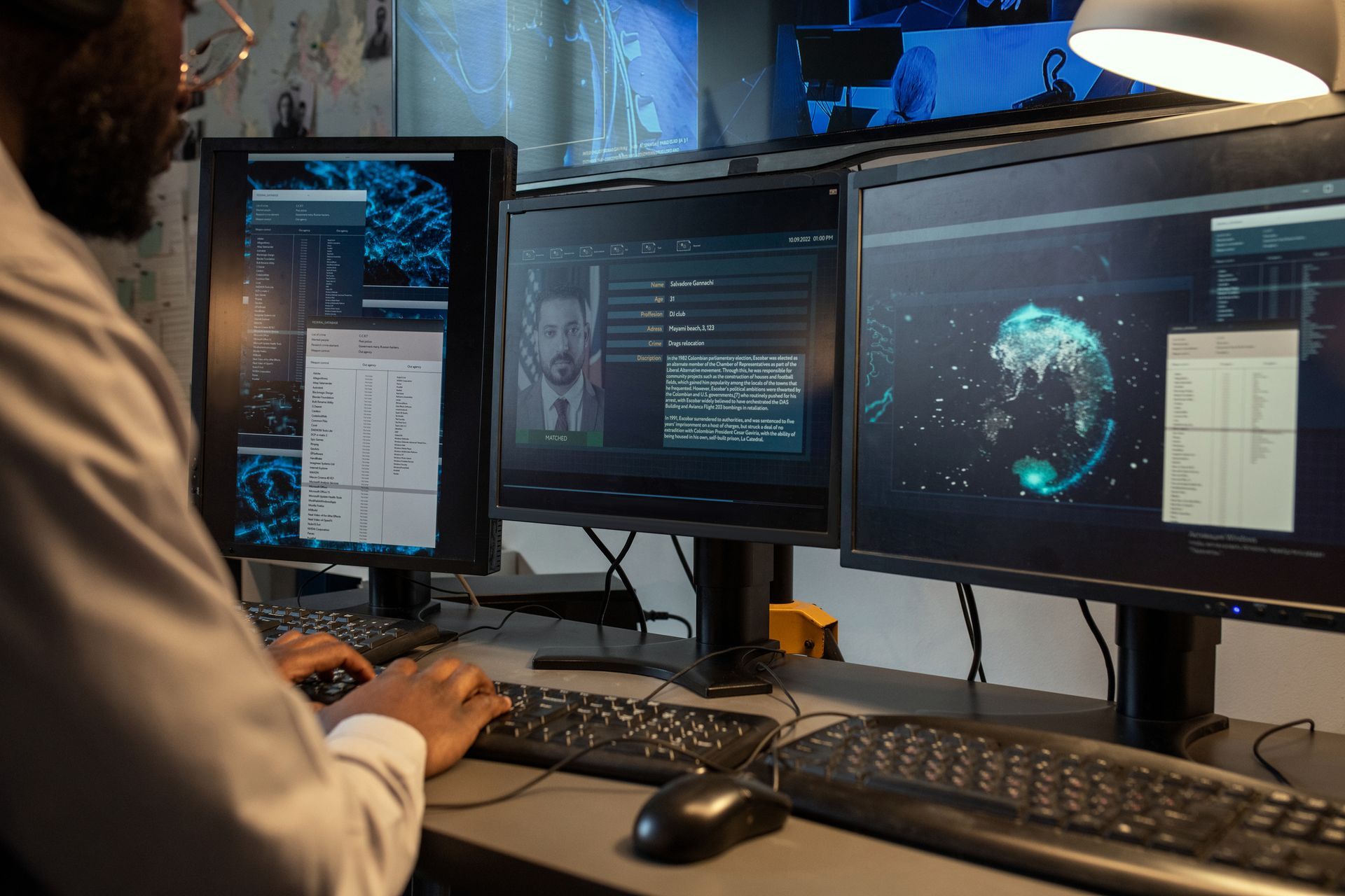 Hands in Blue Gloves Examining Fingerprints with A Magnifying Glass — Birmingham, AL — Magic City Investigations, LLC