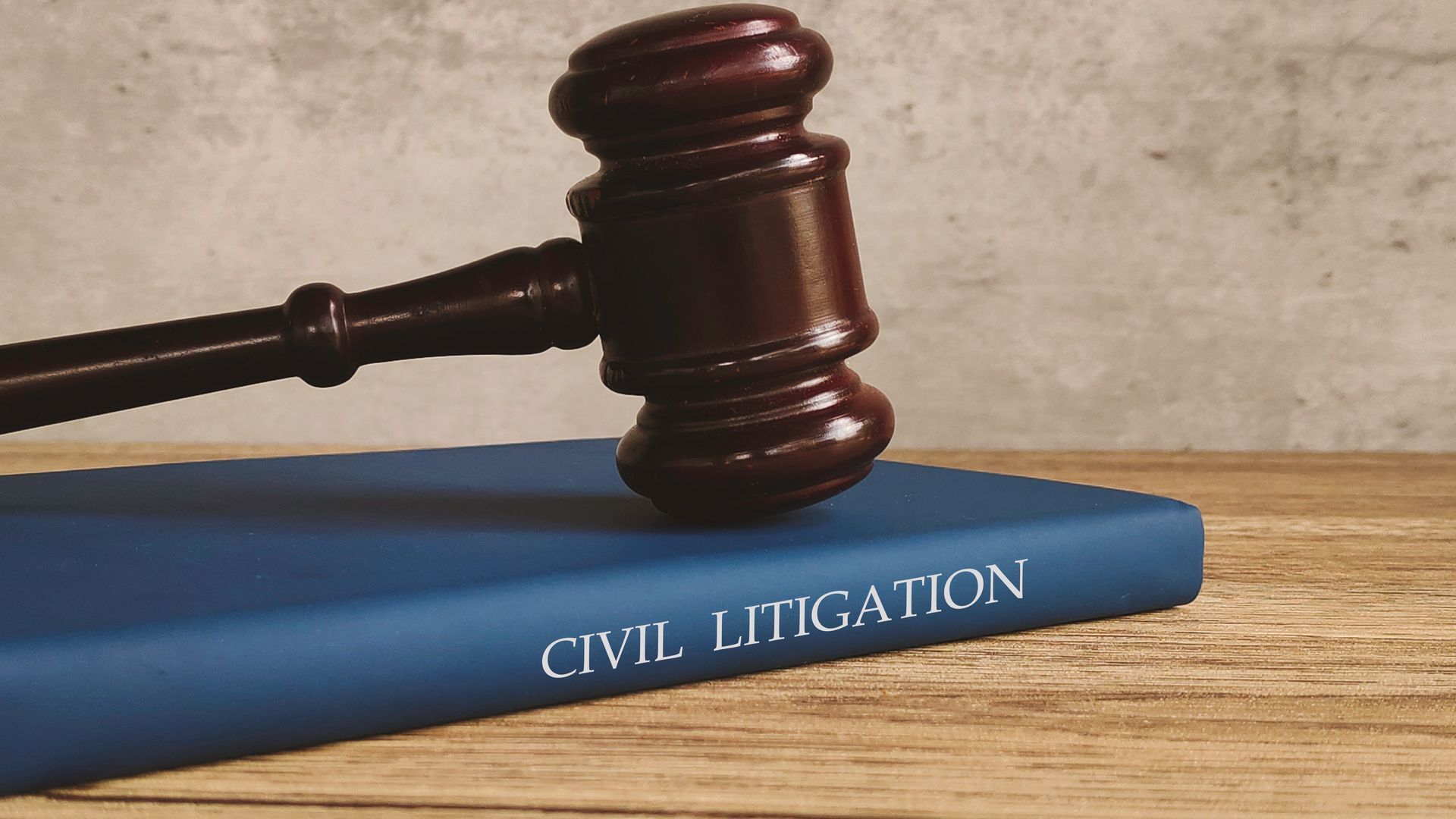 Gavel Resting on a Civil Litigation Book — Birmingham, AL — Magic City Investigations, LLC Gavel Resting on a Civil Litigation Book — Birmingham, AL — Magic City Investigations, LLC