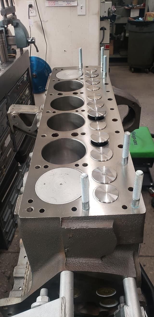 a boat engine block wth cylinder heard rfemoved