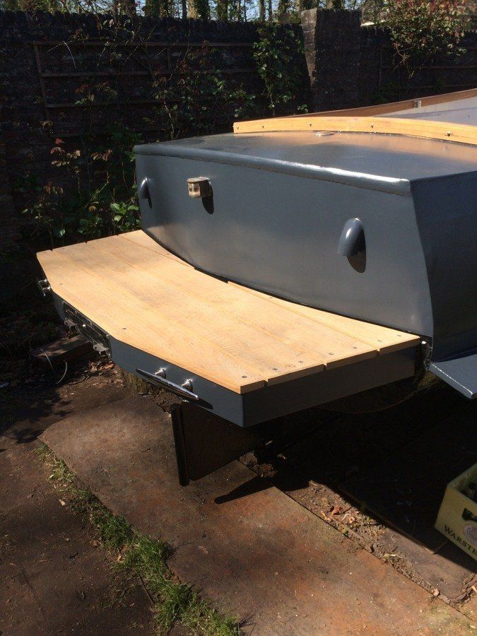 a boat named Michiel de Ruyter being restored in dry dock