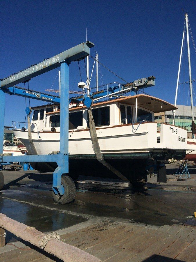 small yacht hauled out of the water