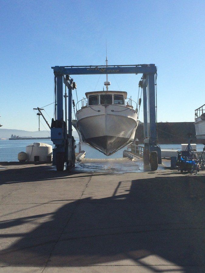 small yacht hauled out of the water