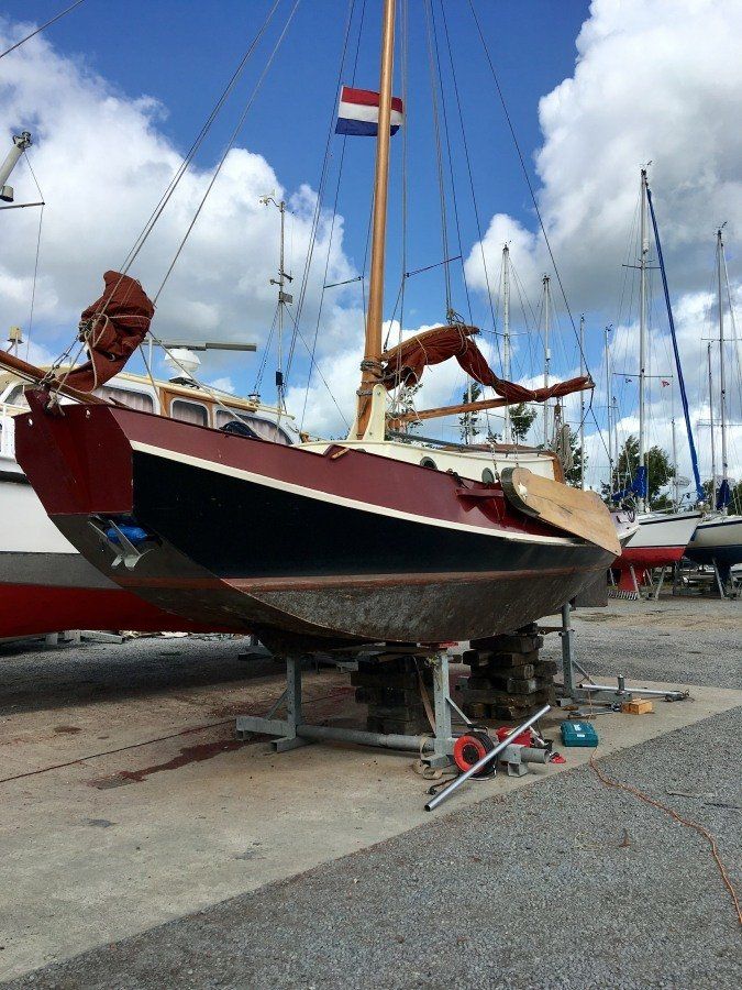 small yacht hauled out of the water