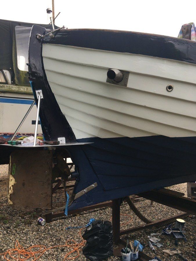 wooden sloop fully restored and painted