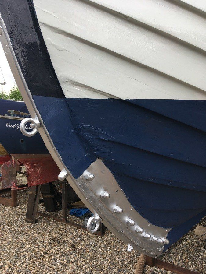 wooden sloop fully restored and painted