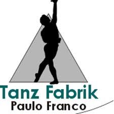 Silhouette of a dancer posed inside a gray triangle, with the words