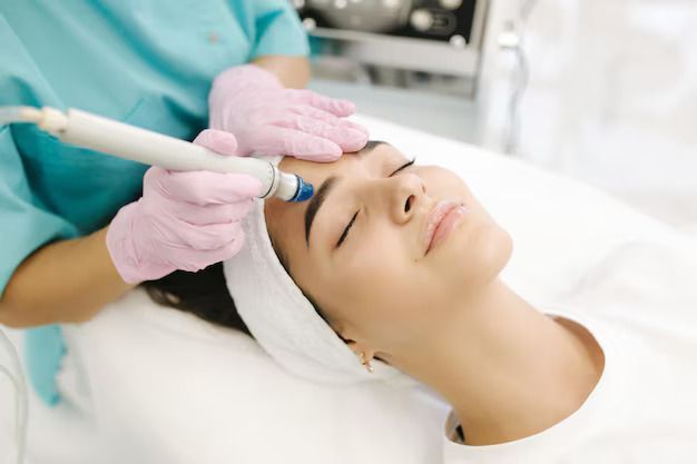 Cosmetic Facial Treatment With a Handheld Device — A9 Skin and Hair Clinic In Westmead, NSW