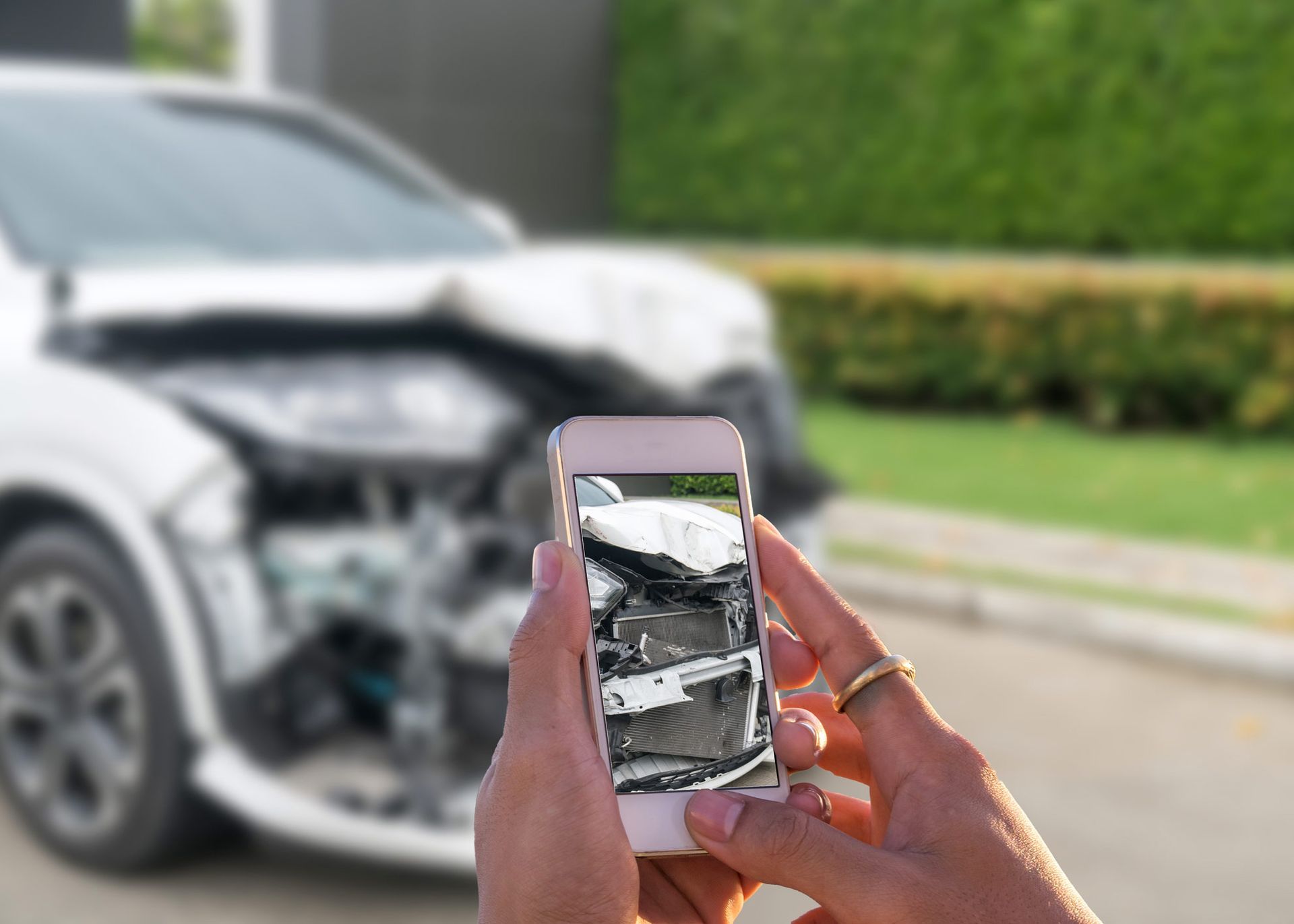 Taking Picture Of Damage Car — Hillsboro, TX — Lehmann Insurance Agency