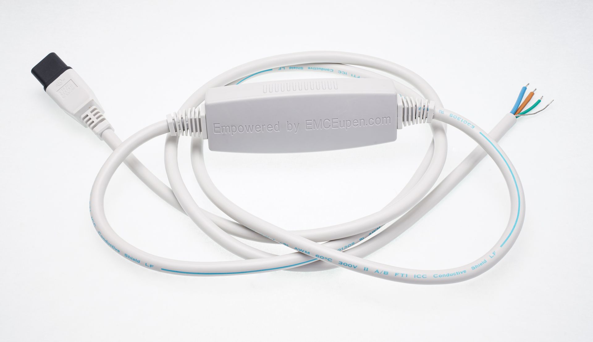 A white cable with a connector on the end is laying on a white surface.