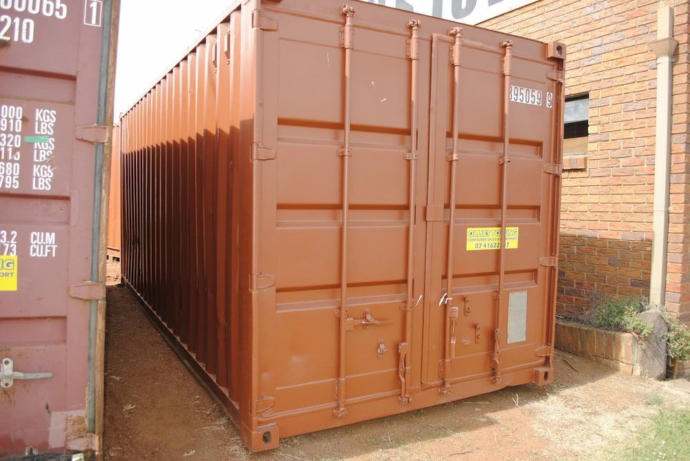 A Brown Shipping Container — Ollies Towing & Shipping Container Sales in Kingaroy, QLD