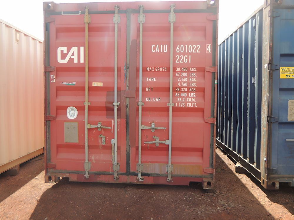 A Red Shipping Container — Ollies Towing & Shipping Container Sales in Kingaroy, QLD