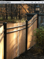 Solid Wood Fence with Black Metal — Danville, IL — Illini Fence Newco