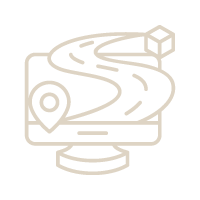 Pantalla de computadora con una carretera, un pin de ubicación y un cubo, que representan la navegación y la planificación.