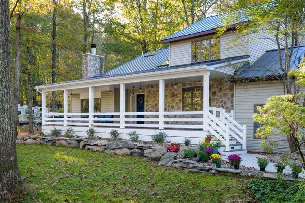 A house with a wooden porch and stairs