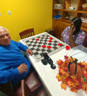 seniors playing board game