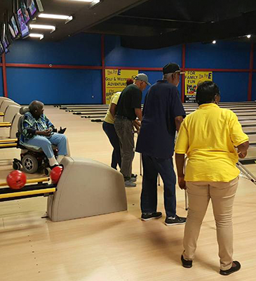 seniors playing bowling
