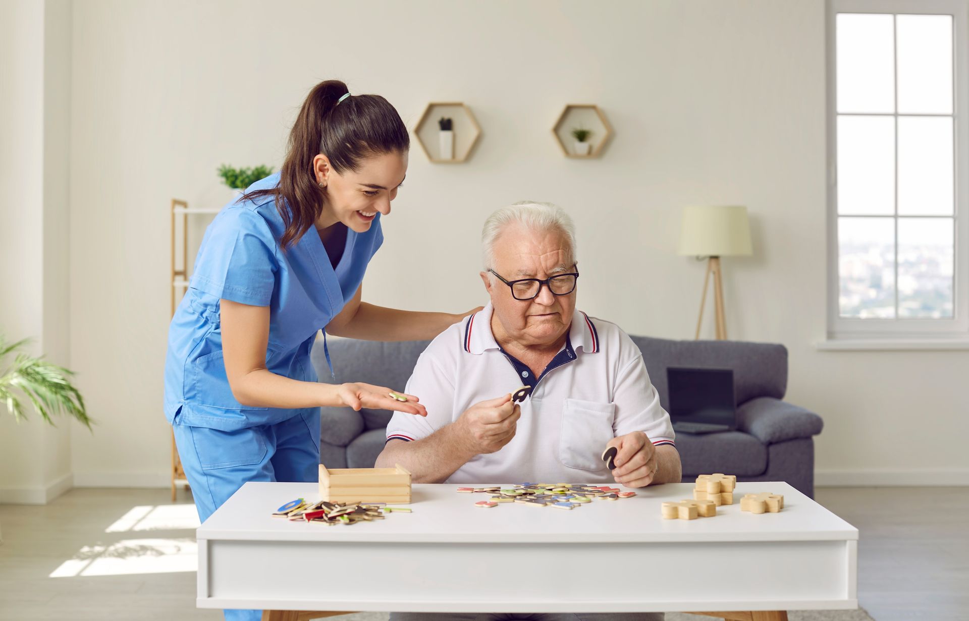 A nurse playing with a dementia patient