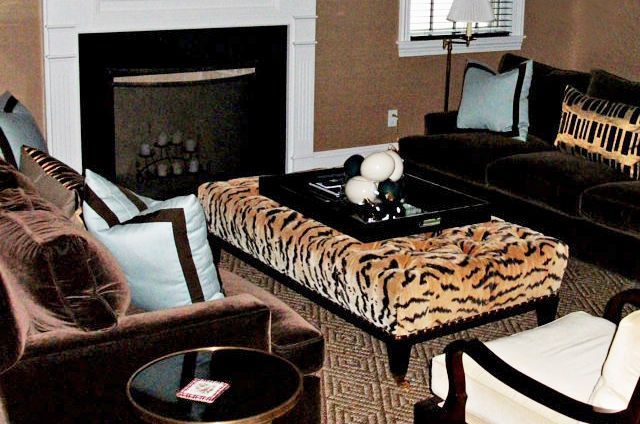 A living room filled with furniture and a fireplace