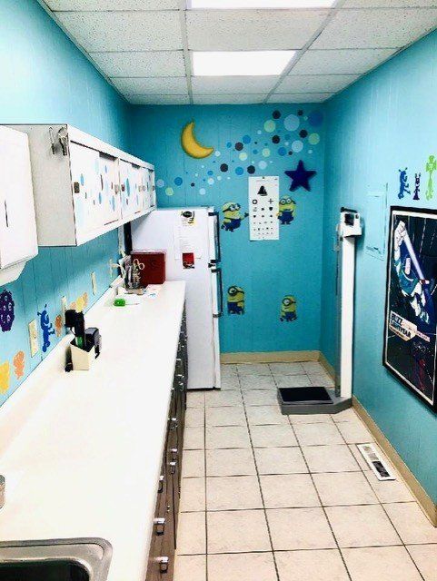 View Of Laboratory Room With Stickers On Wall — Toms River, NJ — Sunny Pediatrics, Inc.