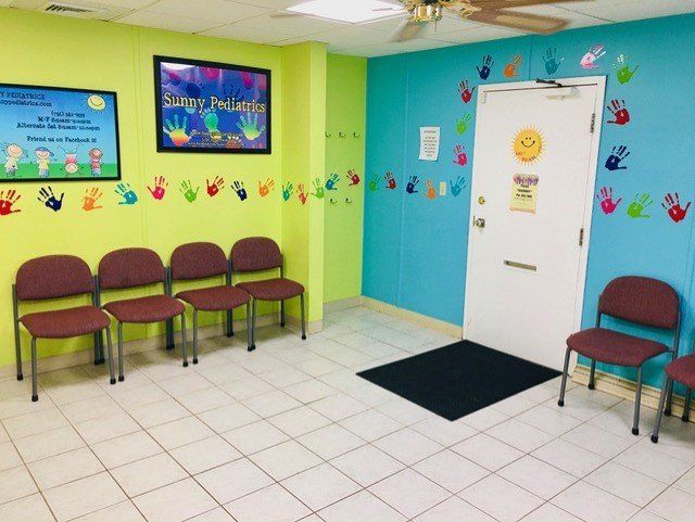 Sick Waiting Room With Hand Sticker On Wall — Toms River, NJ — Sunny Pediatrics, Inc.