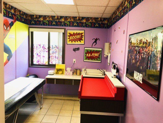 Physician Examines Little Boy By Stethoscope — Toms River, NJ — Sunny Pediatrics, Inc.