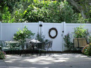 home with PVC fence - Fencing in Ocala, FL