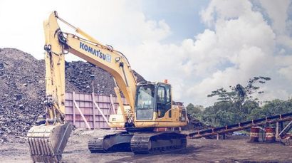 An excavator sits on a construction site