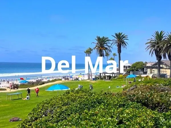 Powerhouse Park at Del Mar beach with a view of the rolling grassy hills.