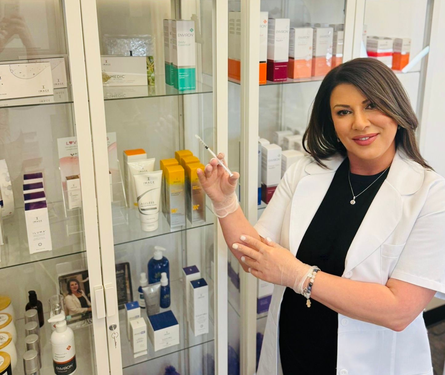 Lela holding botox injections at Lela Skin Care and Facials in Evergreen, CO