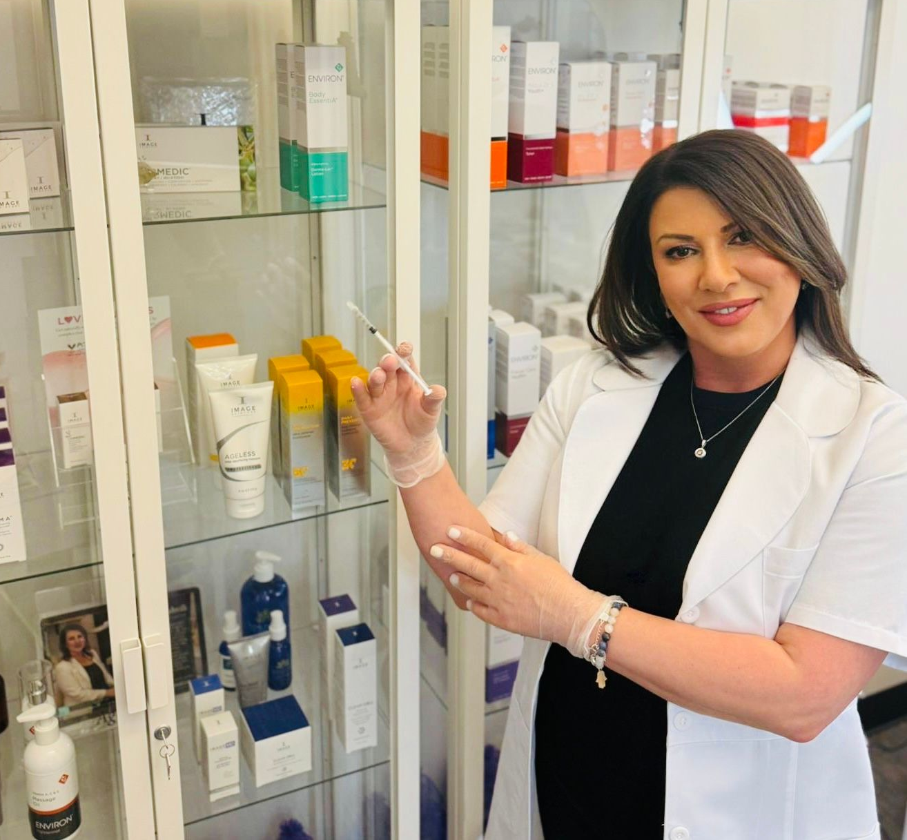 Lela holding botox injections at Lela Skin Care and Facials in Evergreen, CO