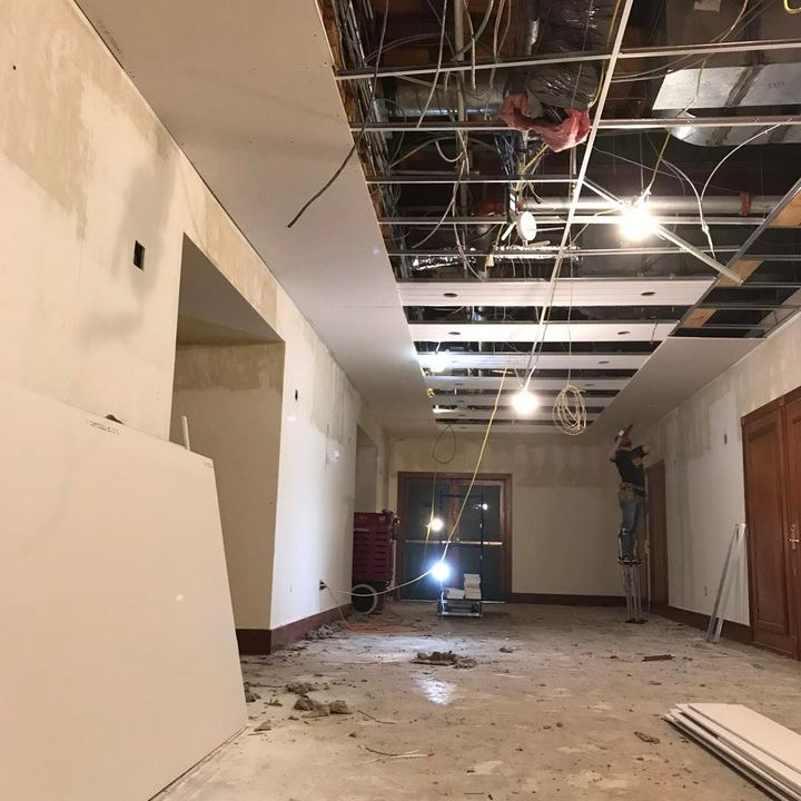 An empty room with a ceiling that is being remodeled