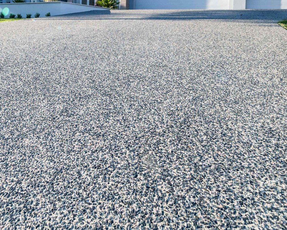 newly installed exposed aggregate driveway in East Valley, AZ