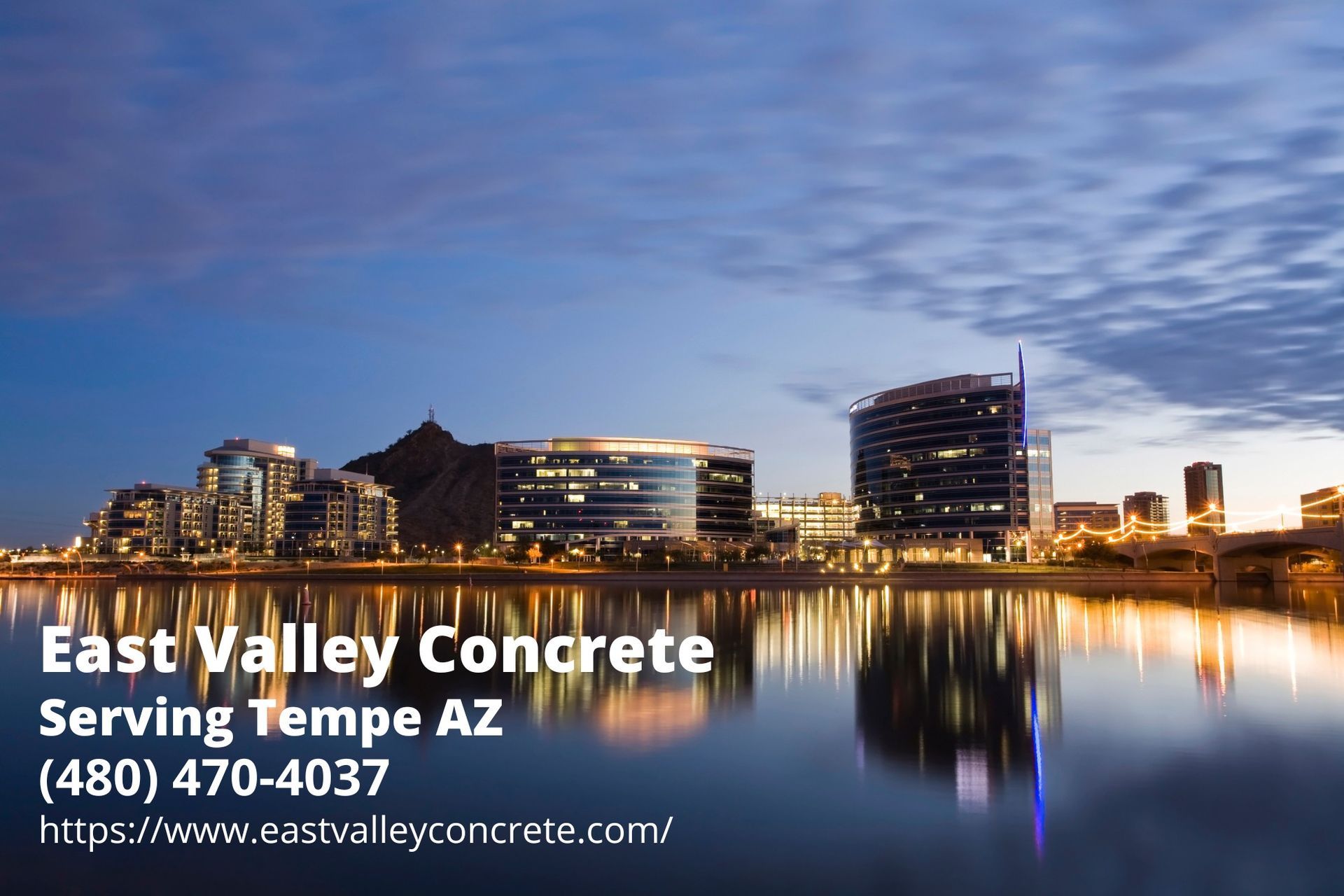 downtown Tempe AZ at nighttime with the business info of East Valley Concrete