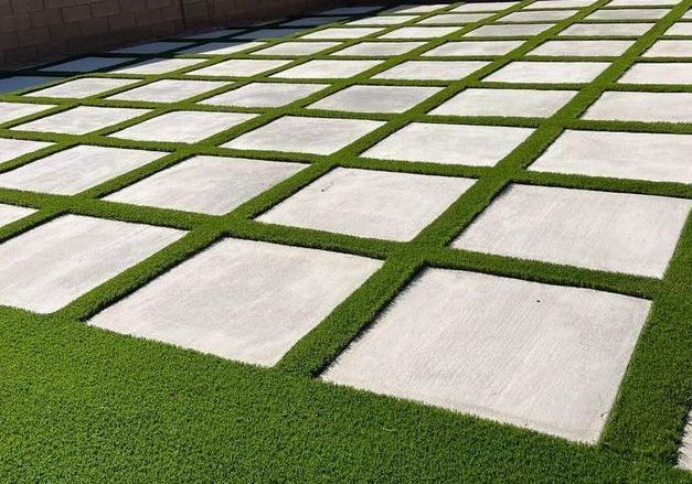 newly installed concrete and artificial grass squares driveway in gilbert arizona