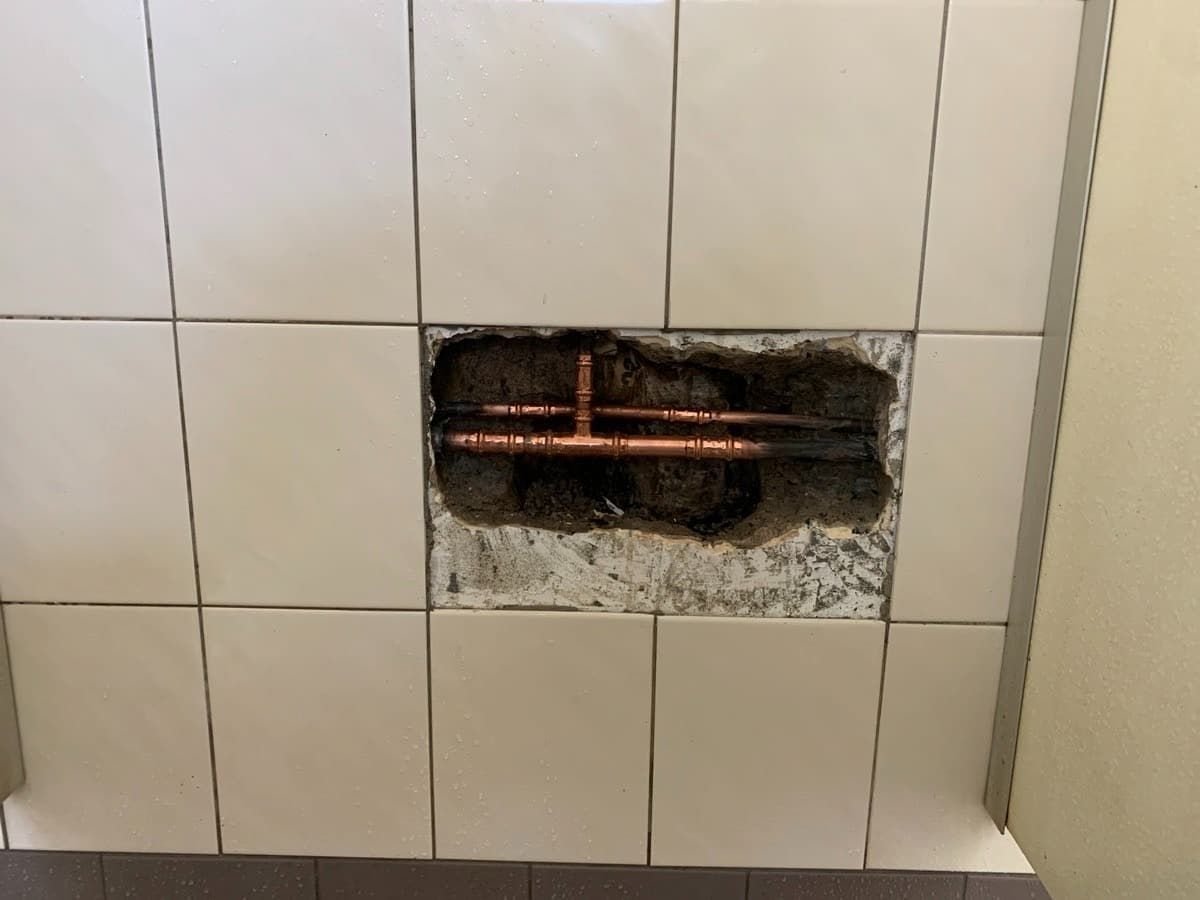 A Section of White Tiles is Removed